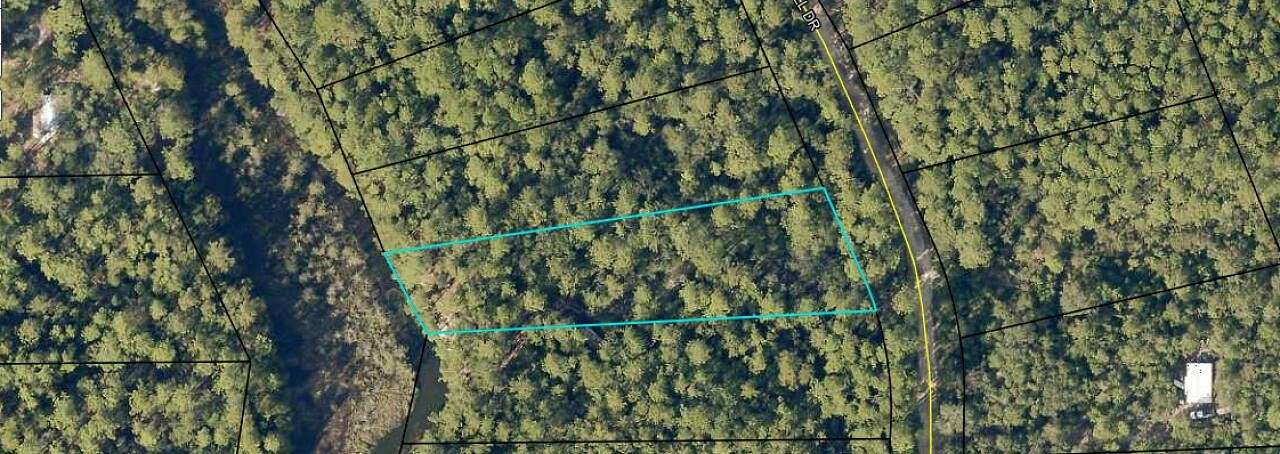 0.9 Acres of Residential Land for Sale in Holt, Florida