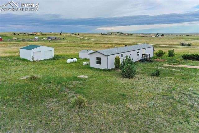 10.53 Acres of Land with Home for Sale in Peyton, Colorado