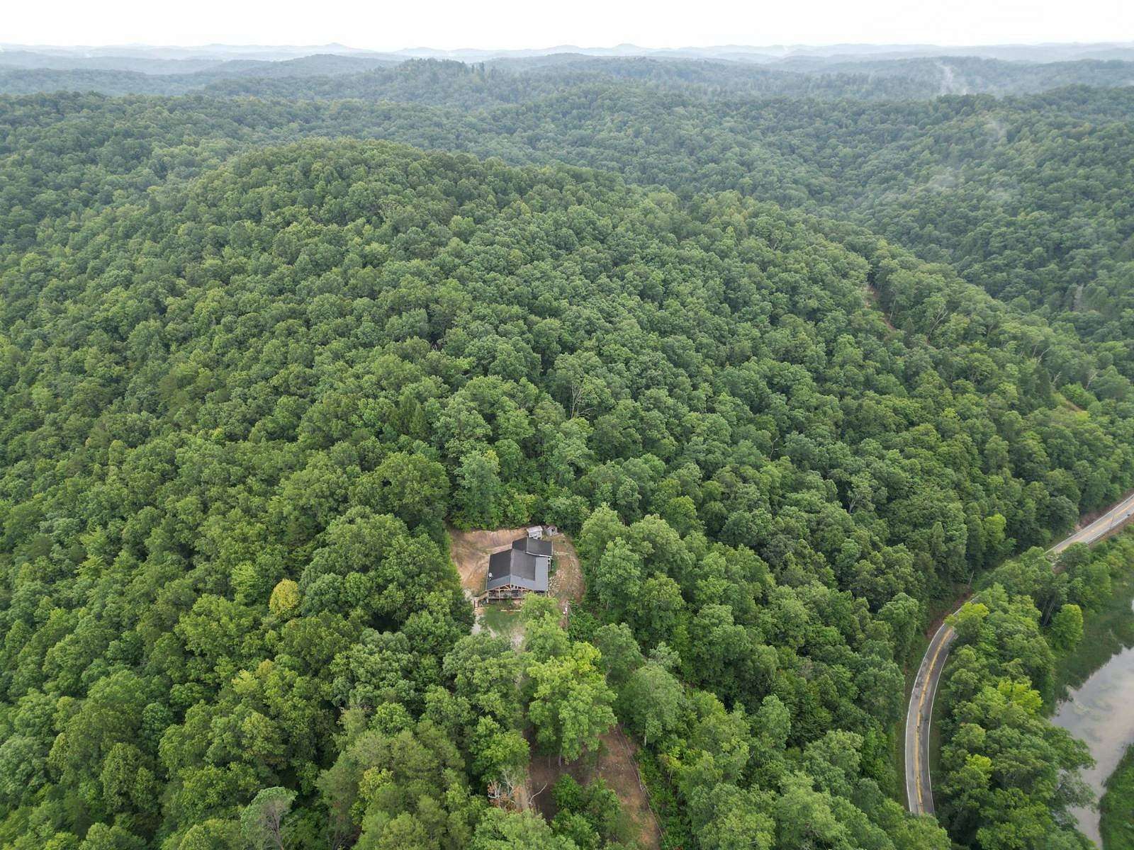 10 Acres of Recreational Land with Home for Auction in Branchland, West Virginia