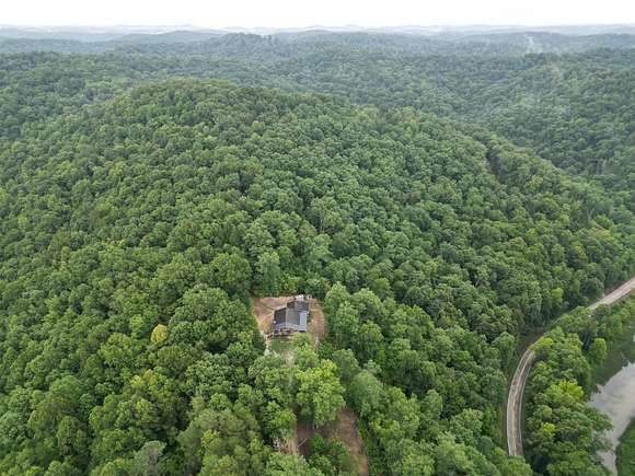 10 Acres of Recreational Land with Home for Auction in Branchland, West Virginia