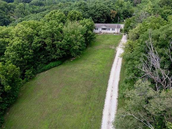 6.13 Acres of Residential Land with Home for Sale in Agency, Missouri