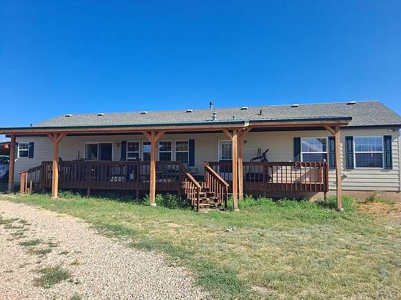 5.2 Acres of Residential Land with Home for Sale in Fort Garland, Colorado