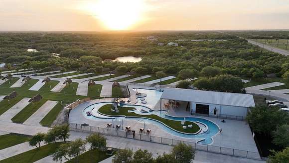 Aerial view of newly renovated pool, lazy river, and clubhouse amenities