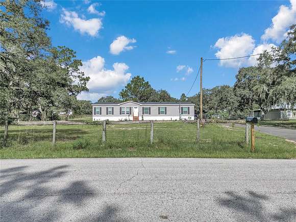 2.44 Acres of Residential Land with Home for Sale in Dunnellon, Florida