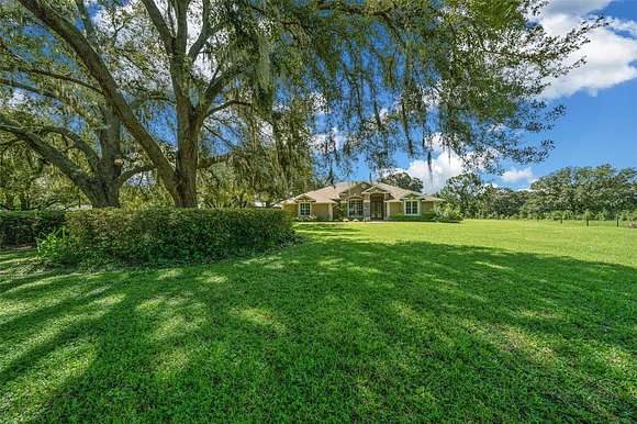 5.2 Acres of Land with Home for Sale in Weirsdale, Florida