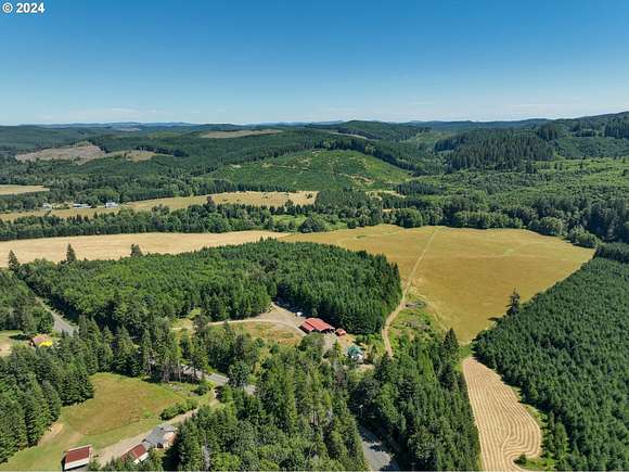 67.81 Acres of Land with Home for Sale in Birkenfeld, Oregon