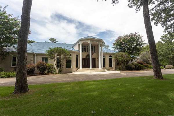 7.18 Acres of Land with Home for Sale in Russellville, Arkansas