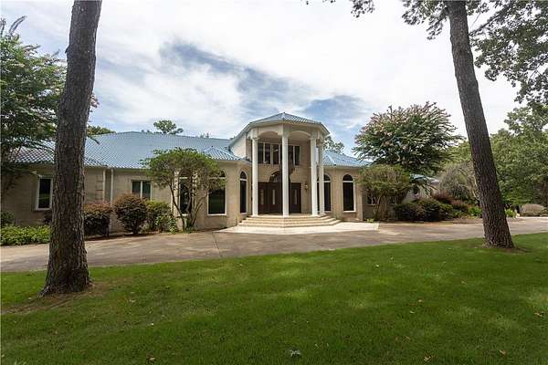 7.19 Acres of Land with Home for Sale in Russellville, Arkansas