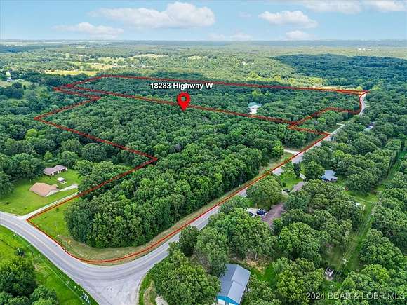 61 Acres of Recreational Land with Home for Sale in Versailles, Missouri