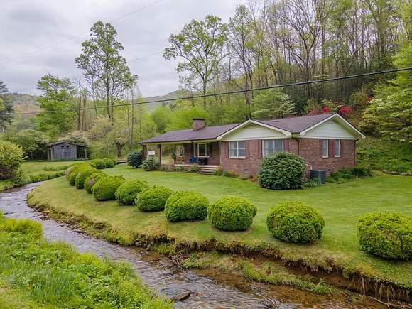 13.33 Acres of Land with Home for Sale in Sylva, North Carolina