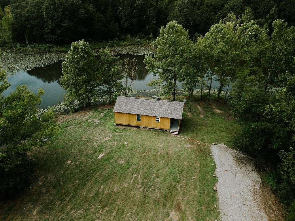 596 Acres of Recreational Land with Home for Sale in Drakesboro, Kentucky