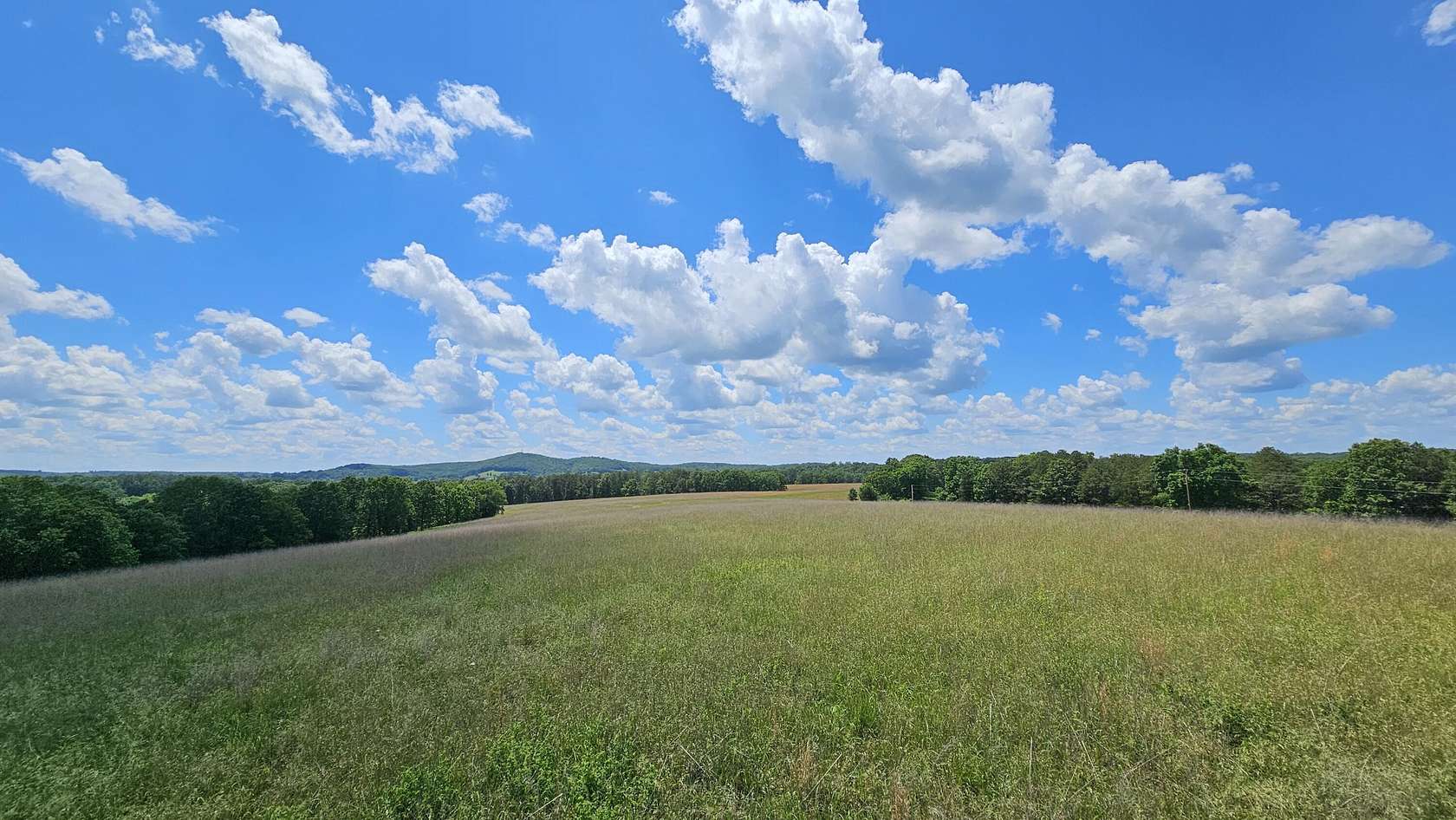 225 Acres of Land with Home for Sale in Vanzant, Missouri