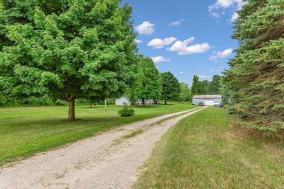 21 Acres of Land with Home for Sale in Sidney, Michigan