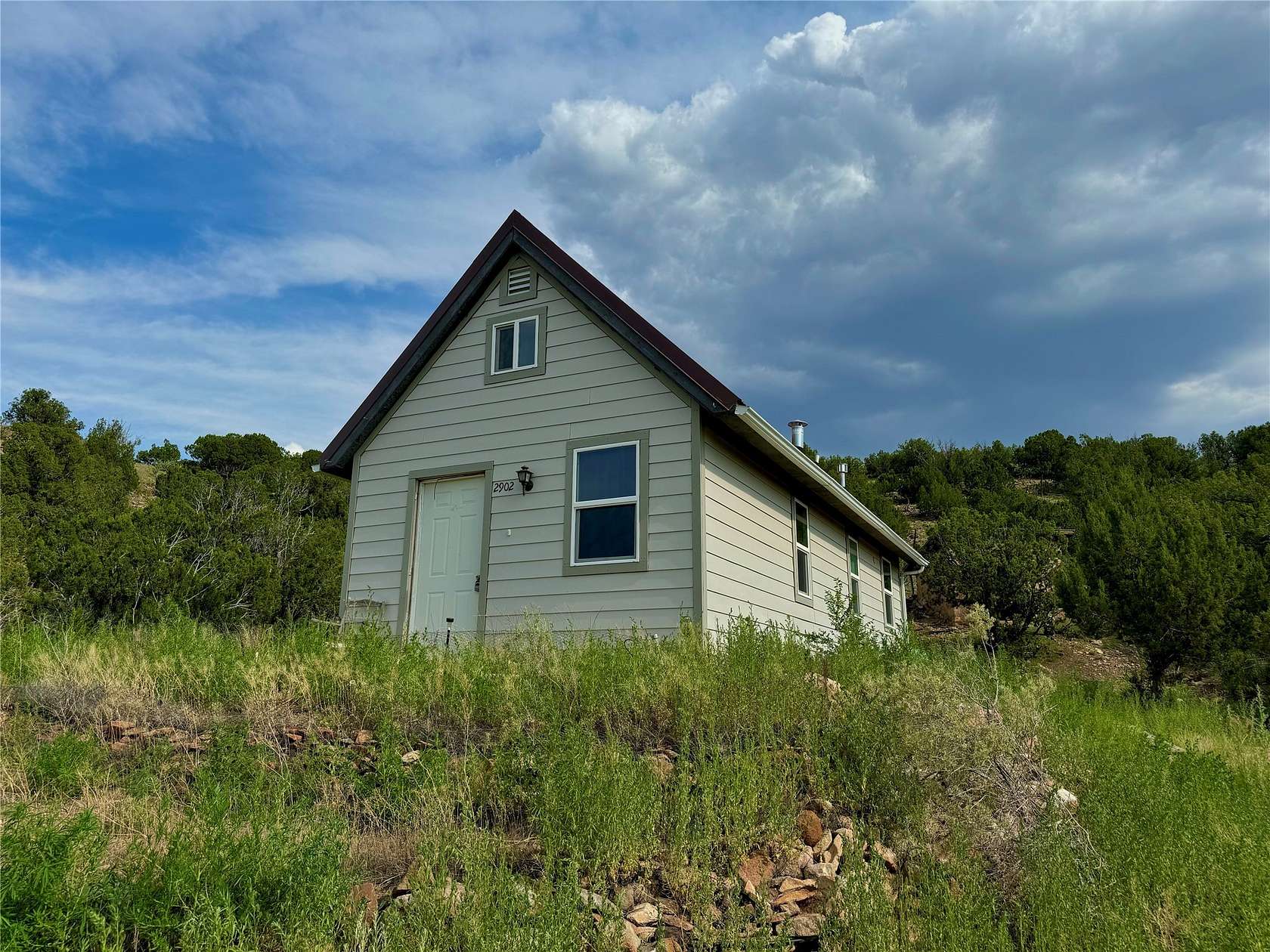 1 Acre of Residential Land with Home for Sale in Madrid, New Mexico