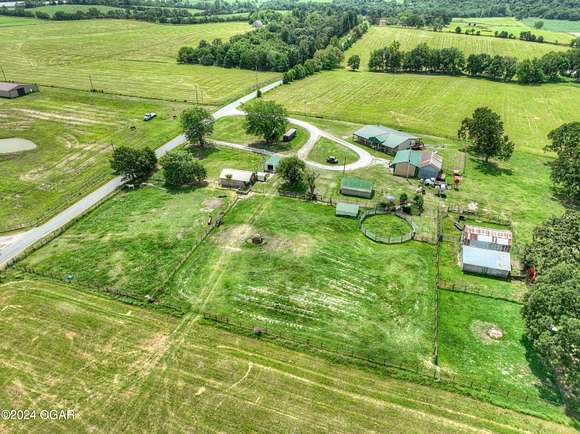 24 Acres of Agricultural Land with Home for Sale in Purdy, Missouri