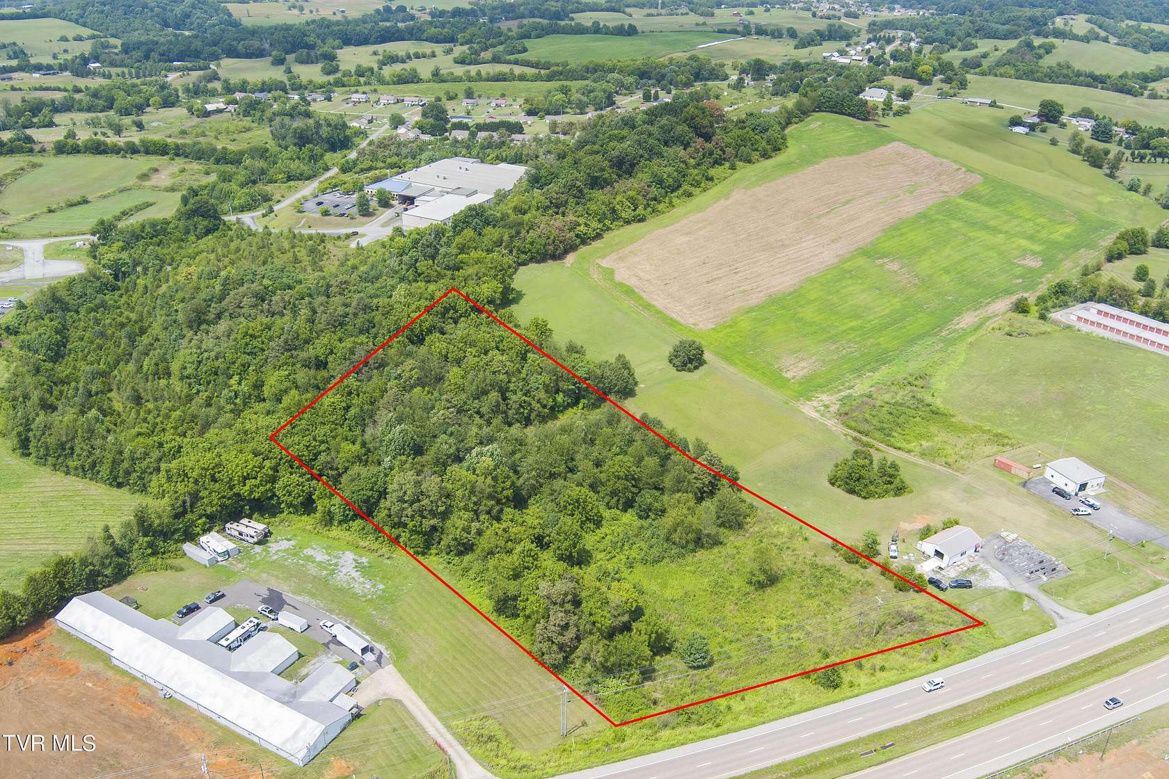 5.11 Acres of Commercial Land for Sale in Telford, Tennessee