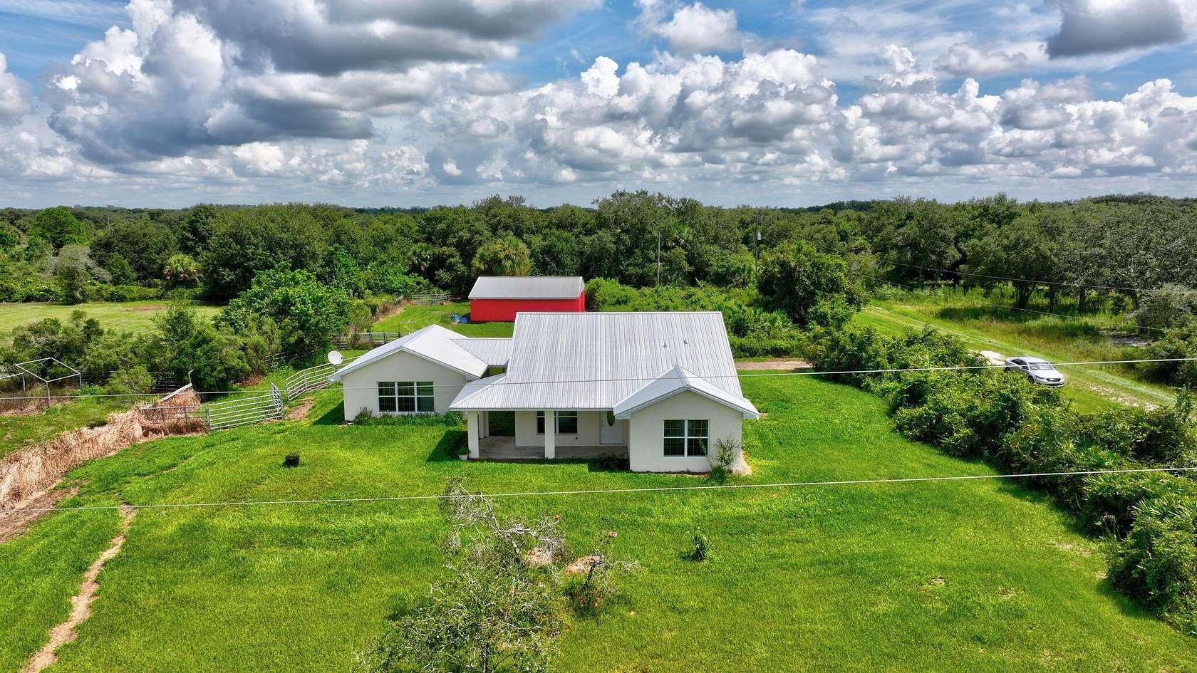 2.5 Acres of Residential Land with Home for Sale in Okeechobee, Florida