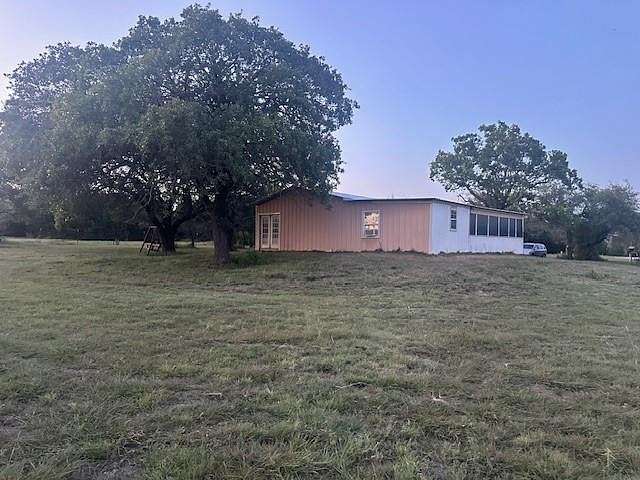 5.311 Acres of Residential Land with Home for Sale in Lipan, Texas