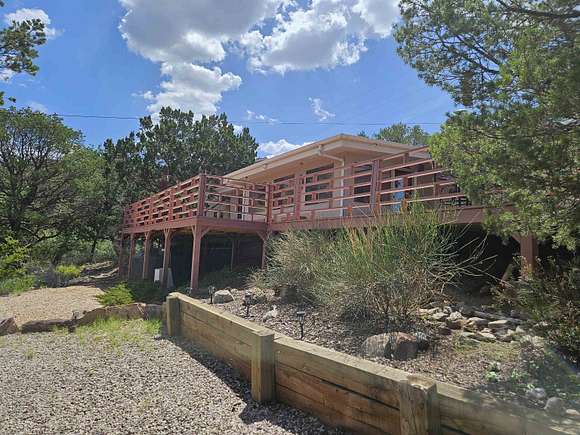 3 Acres of Residential Land with Home for Sale in High Rolls, New Mexico