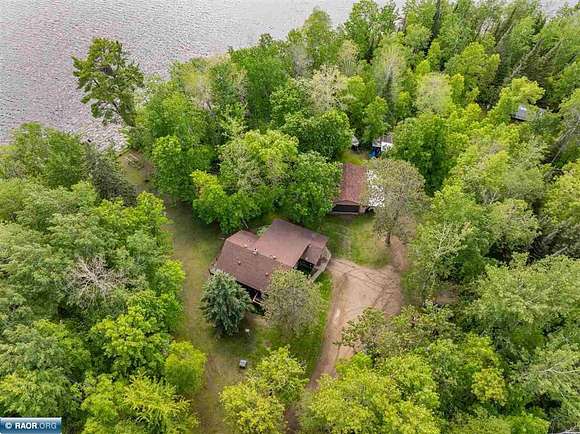 11.6 Acres of Recreational Land with Home for Sale in Bovey, Minnesota