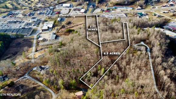 10.77 Acres of Land with Home for Sale in Oneida, Tennessee