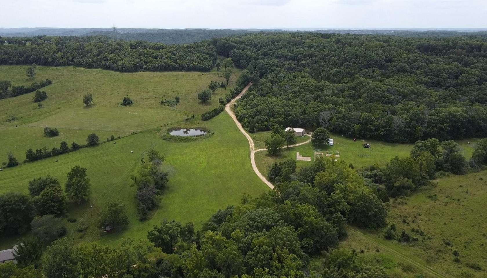 200 Acres of Land with Home for Sale in Oldfield, Missouri