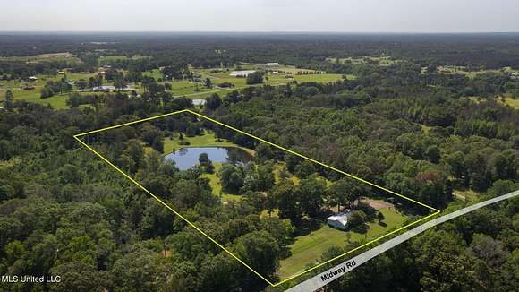 12.76 Acres of Land with Home for Sale in Terry, Mississippi