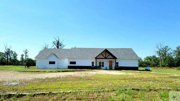 24.5 Acres of Land with Home for Sale in Bogata, Texas