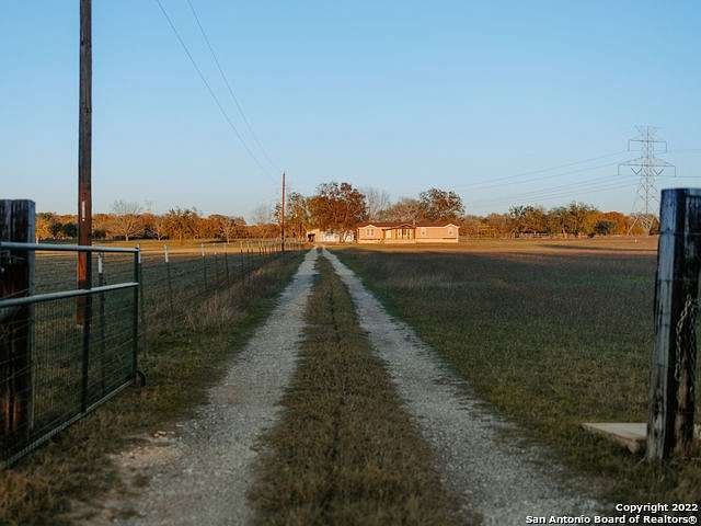 31.46 Acres of Agricultural Land with Home for Sale in Stockdale, Texas