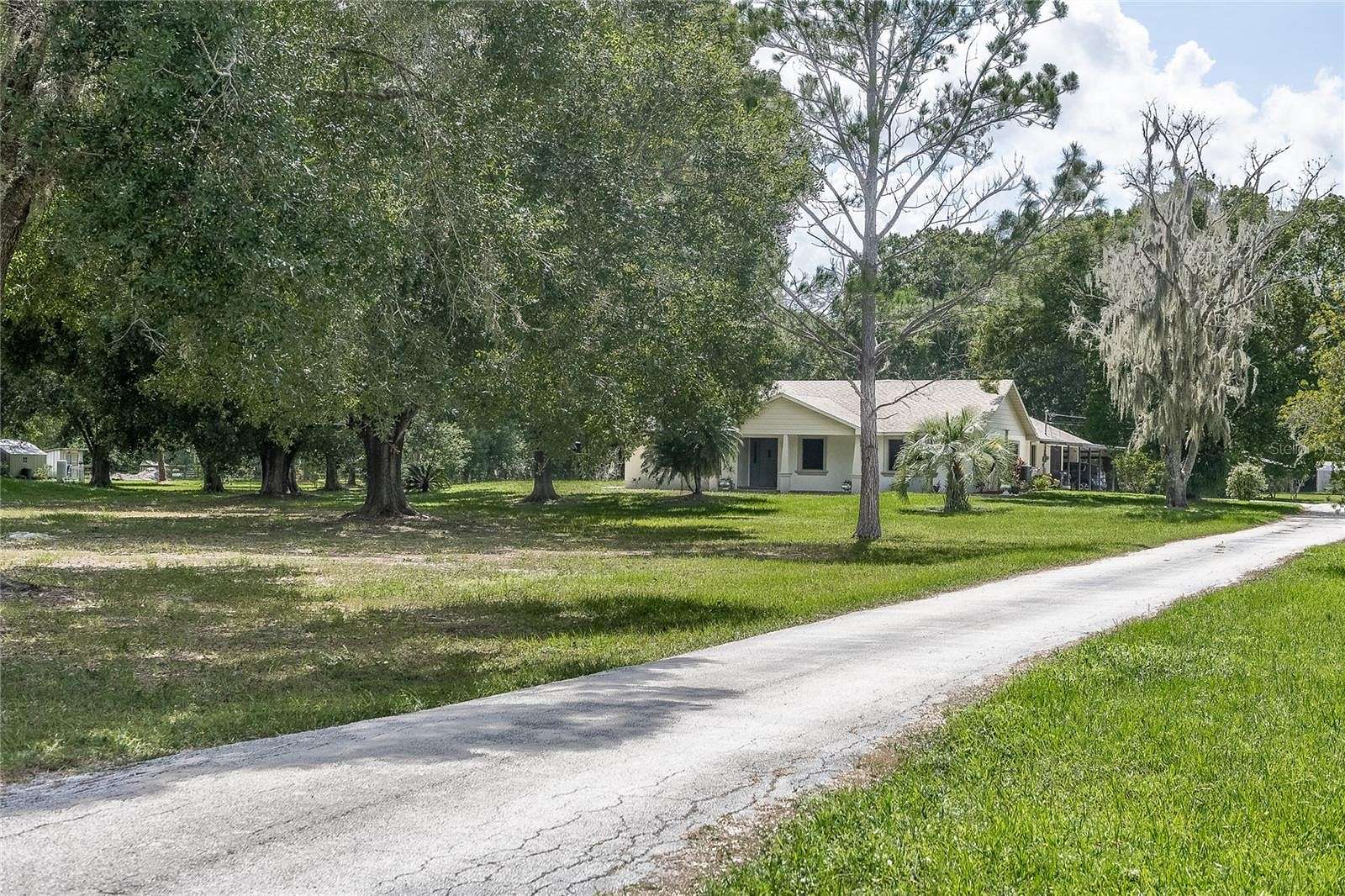 2.39 Acres of Residential Land with Home for Sale in Winter Haven, Florida