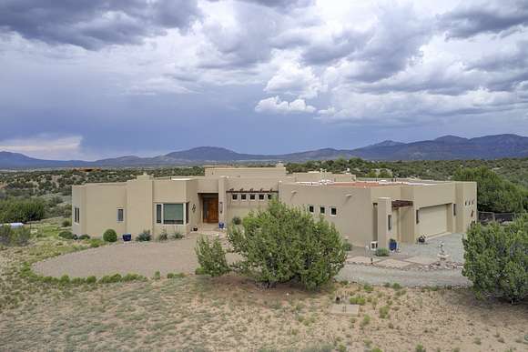 10.24 Acres of Land with Home for Sale in Sandia Park, New Mexico