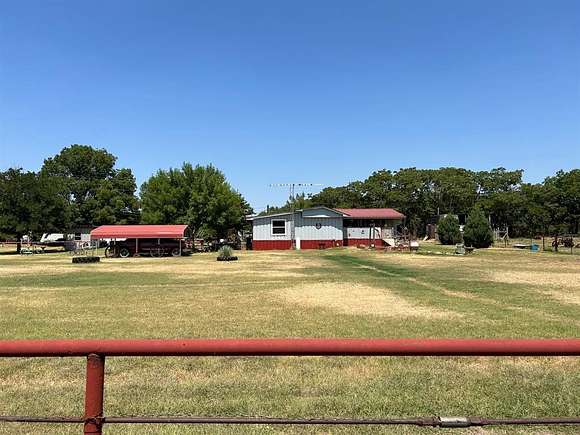 9.9 Acres of Residential Land with Home for Sale in Iowa Park, Texas