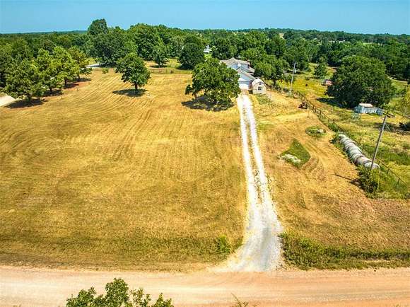 5 Acres of Residential Land with Home for Sale in Wanette, Oklahoma