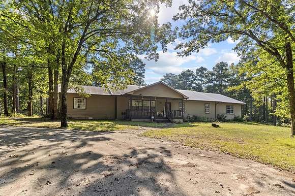 27.45 Acres of Recreational Land with Home for Sale in Winnsboro, Texas