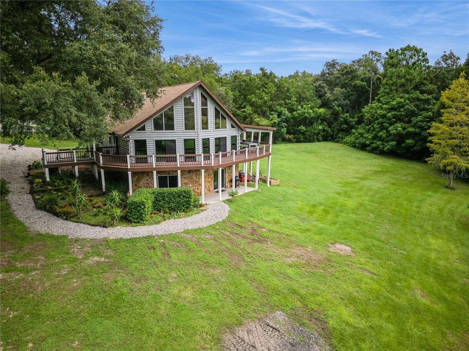 3 Acres of Residential Land with Home for Sale in Umatilla, Florida