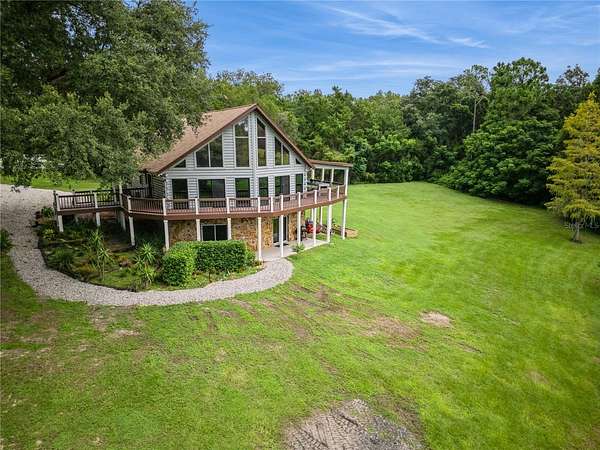 3 Acres of Residential Land with Home for Sale in Umatilla, Florida