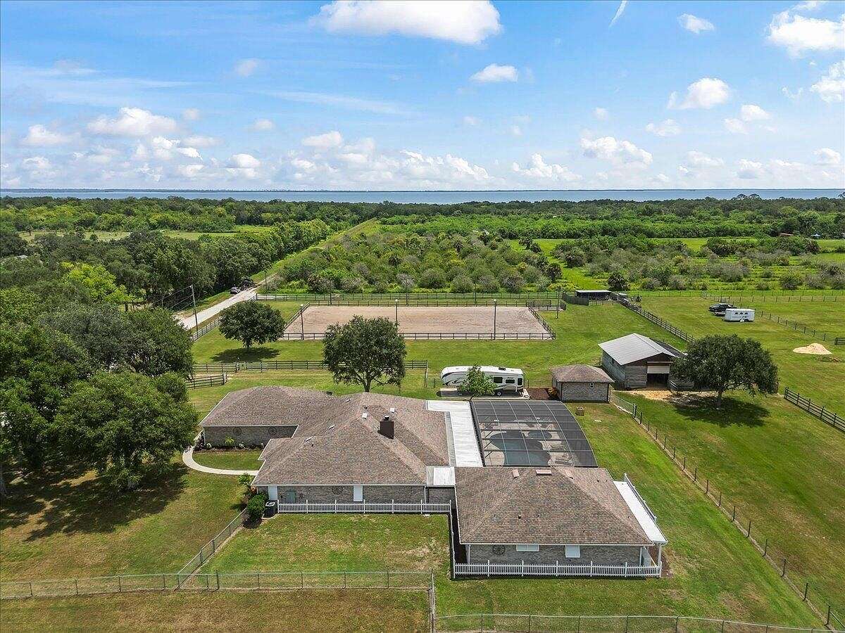 4.5 Acres of Residential Land with Home for Sale in Mims, Florida