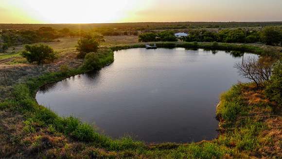 1,051 Acres of Land with Home for Sale in Childress, Texas