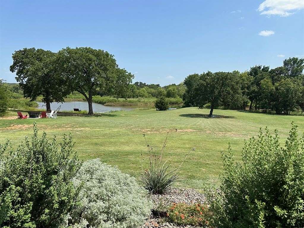 2.56 Acres of Residential Land with Home for Sale in Nocona, Texas