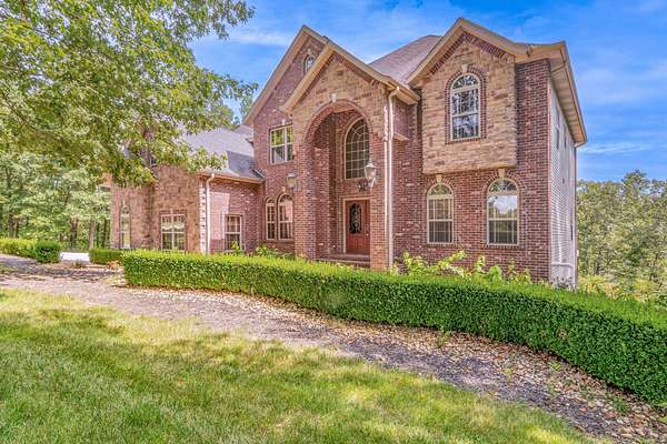 19.3 Acres of Land with Home for Sale in Walnut Shade, Missouri