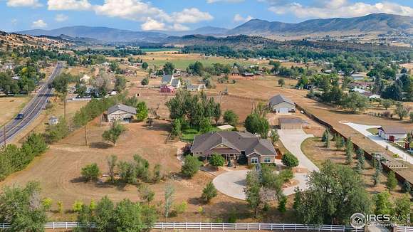 4.8 Acres of Residential Land with Home for Sale in Loveland, Colorado