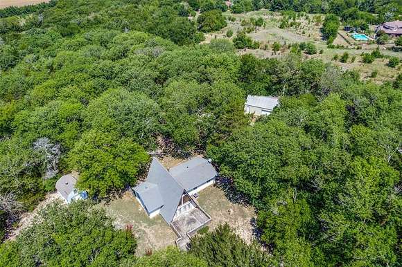 10 Acres of Recreational Land with Home for Sale in Whitewright, Texas