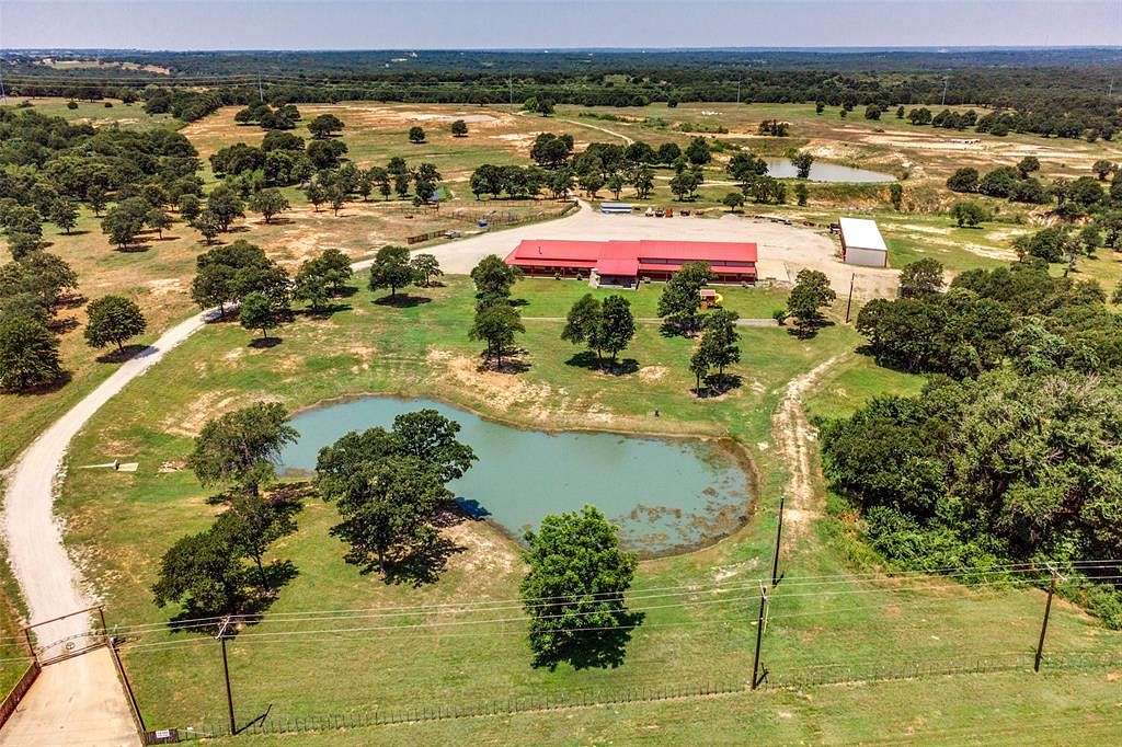 391 Acres of Agricultural Land with Home for Sale in Poolville, Texas