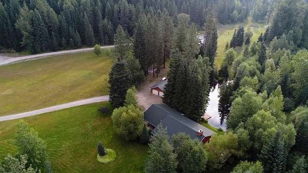 10.9 Acres of Land with Home for Sale in Bigfork, Montana