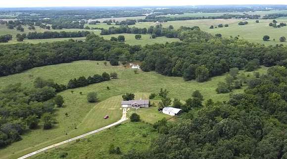 98.5 Acres of Land with Home for Sale in Bolivar, Missouri