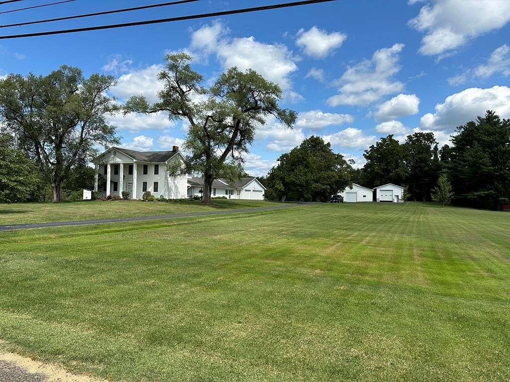 7.578 Acres of Residential Land with Home for Auction in Lucasville, Ohio