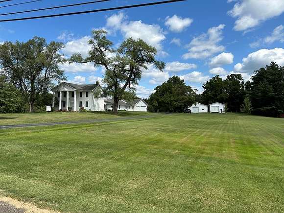 7.578 Acres of Residential Land with Home for Auction in Lucasville, Ohio