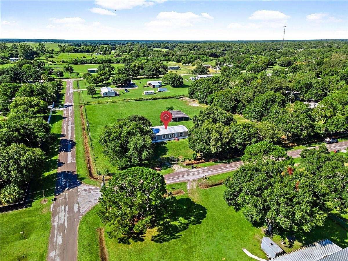 2.01 Acres of Residential Land with Home for Sale in Clewiston, Florida