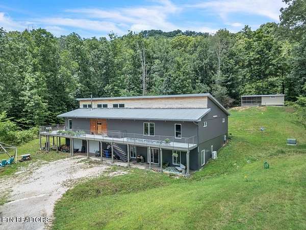 9.76 Acres of Residential Land with Home for Sale in Knoxville, Tennessee