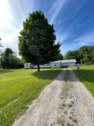 10.4 Acres of Land with Home for Sale in Norfolk, New York